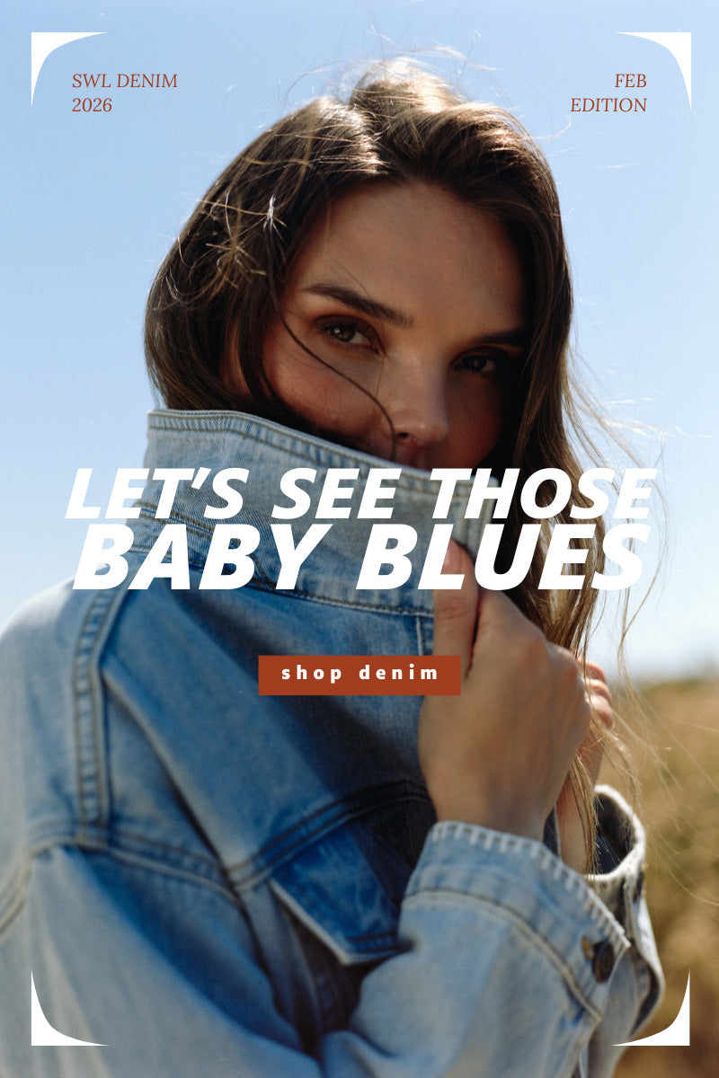 Woman wearing a denim jacket with promotional text overlay against a blue sky