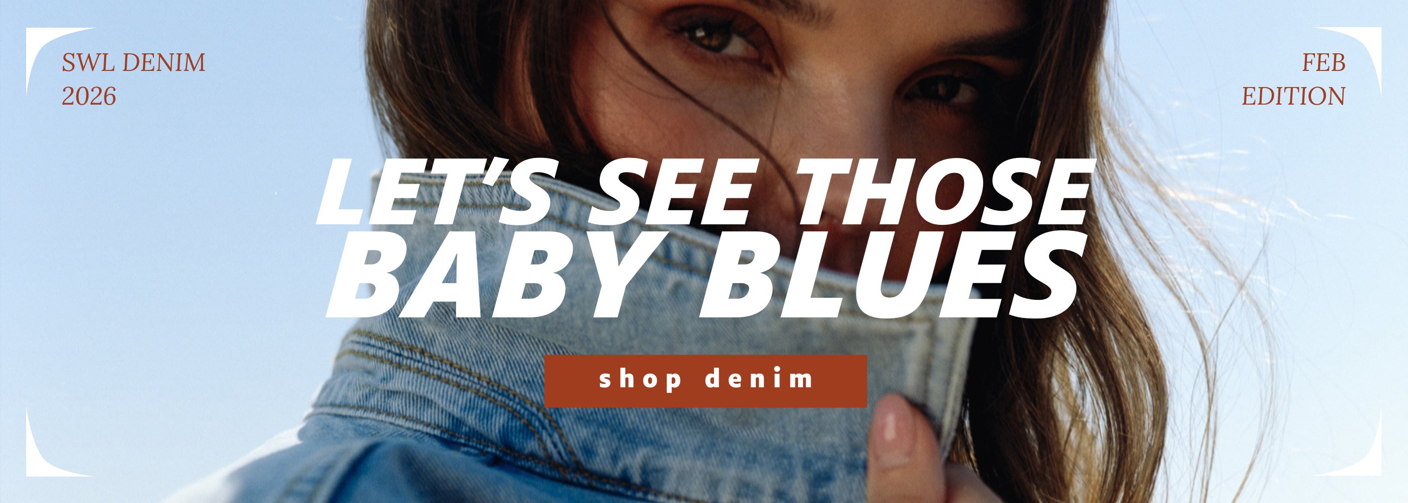Promotional banner for denim with a woman wearing a denim jacket and text 'Let's see those baby blues' on a blue background