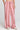 Front view of a woman wearing the Saltwater Luxe Adair Pant in Coffee on a neutral background