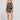 Full body front view of a woman wearing the Saltwater Luxe Bristal Romper in Black on a neutral background