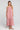 Front view of a woman wearing the Saltwater Luxe Bryent Midi Dress in Coffee on a neutral background