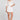 Full body front view of a woman wearing the Saltwater Luxe Celestia Short on a neutral background