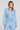 Front view of a woman wearing the Saltwater Luxe Delmar Jacket in Dusty Blue on a neutral background