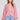 Front view of a woman wearing the Saltwater Luxe Ellyn Sweater in Mulberry on a neutral background