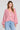 Front view of a woman wearing the Saltwater Luxe Ellyn Sweater in Mulberry on a neutral background