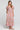 Front view of a woman wearing the Saltwater Luxe Evra Maxi Dress on a neutral background