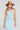 Front view of a woman wearing the Saltwater Luxe aelle Tank in Azure Blue on a neutral background