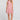 Front view of a woman wearing the Saltwater Luxe Genneva Mini Dress in Coffee on a neutral background