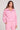 Front view of a woman wearing the Saltwater Luxe Half Zip Petunia Seam Pullover on a neutral background