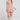 Front view of a woman wearing the Saltwater Luxe Holand Mini Dress on a neutral background