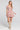 Front view of a woman wearing the Saltwater Luxe Holand Mini Dress on a neutral background