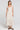 Front view of a woman wearing the Saltwater Luxe Junniper Midi Dress on a neutral background