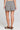 Back view of a woman wearing the Saltwater Luxe Leto Short  on a neutral background
