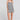 Full body front view of a woman wearing the Saltwater Luxe Leto Short  on a neutral background