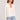Front view of a woman wearing the Saltwater Luxe Long Sleeve Ecru Cardigan on a neutral background