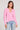 Front view of a woman wearing the Saltwater Luxe Long Sleeve Petunia Cardigan on a neutral background