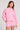 Front view of a woman wearing the Saltwater Luxe Long Sleeve Petunia Pullover on a neutral background