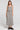 A full body front view of a woman wearing the Saltwater Luxe Louissa Tank on a neutral background