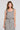 Front view of a woman wearing the Saltwater Luxe Louissa Tank on a neutral background