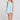 Front view of a woman wearing the Saltwater Luxe Lukas Mini Dress on a neutral background