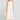 Front view of a woman wearing the Saltwater Luxe Marcelia Salt on a neutral background