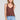 Front view of a woman wearing the Saltwater Luxe Marlie Coffee Tank on a neutral background