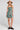 Front view of a woman wearing the Saltwater Luxe Marria Mini Dress on a neutral background