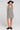 Front view of a woman wearing the Saltwater Luxe Pettra Mini Dress on a neutral background