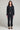 Full body front view of a woman wearing the Saltwater Luxe Pull On Black Jogger Pant on a neutral background