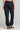 Back view of a woman wearing the Saltwater Luxe Pull On Black Jogger Pant on a neutral background