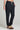 Side angle view of a woman wearing the Saltwater Luxe Pull On Black Jogger Pant on a neutral background