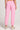 Back view of a woman wearing the Saltwater Luxe Pull On Petunia Jogger Pant on a neutral background