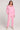 A full body front view of a woman wearing the Saltwater Luxe Pull On Petunia Jogger Pant on a neutral background