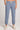 Front view of a woman wearing the Saltwater Luxe Pull On Worn Blue Jogger Pant on a neutral background