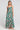 Front view of a woman wearing the Saltwater Luxe Rene Midi Dress on a neutral background