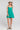Front view of a woman wearing the Saltwater Luxe Renoa Mini Dress on a neutral background