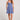 Full body front view of a woman wearing the blue Saltwater Luxe Jazmyn Mini Dress against a plain background