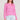 Front view of a woman wearing the Saltwater Luxe pink Amorette Magnolia Sweater and denim shorts on a plain background