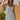 Front view of a woman wearing the Saltwater Luxe light blue Daweson Tank with matching Tatumn Maxi Skirt and straw hat outdoors