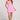 Front view of a woman wearing the Saltwater Luxe pink Deliah Dahlia Mini Dress on a white background