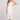 Front view of a woman wearing the Saltwater Luxe Elowena Salt White Midi Dress on a plain background