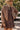 Front view of a woman wearing the Saltwater Luxe Tamira Jacket on a neutral background with the Ginna Mini Dress