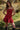 Model wearing the Saltwater Luxe Riven Mini Dress in Crimson with slim straps, editorial view
