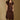 Model wearing the Saltwater Luxe Serin Midi Dress in Multi with a square neckline and puff sleeves, front view