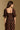Model wearing the Saltwater Luxe Eddith Top in Multi with a square neckline and puff sleeves, back view
