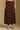Model wearing the Saltwater Luxe Nolla Multi Midi Skirt with a straight silhouette, front view