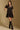 Model wearing the Saltwater Luxe Yaz Black Mini Dress with short puff sleeves, front view