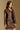 Model wearing the Saltwater Luxe Ryland Jacket in Chocolate with a pointed collar, side view