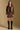 Model wearing the Saltwater Luxe Ryland Jacket in Chocolate with a pointed collar, full-body view