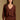 Model wearing the Saltwater Luxe Sutton Chocolate Sweater with ribbed texture, front view